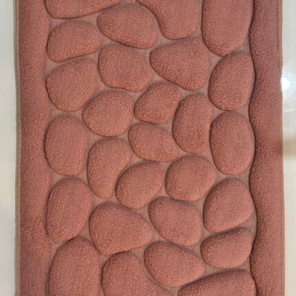 soft pebble-texture floor mat in warm terracotta tone | cushioned comfort & easy care