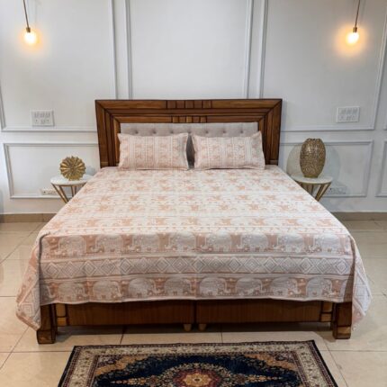 MAJESTIC PEACH ELEPHANT HERITAGE BEDCOVER – A TIMELESS ETHNIC STATEMENT