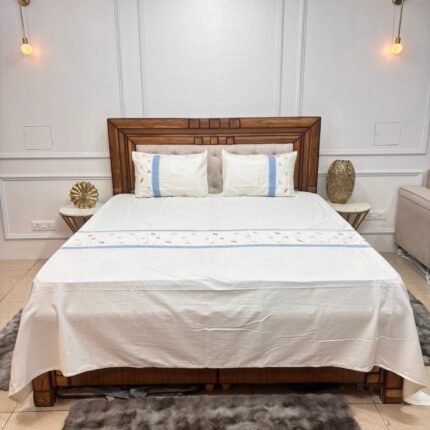 The Serene Choice: Sky Blue Wildflower Embroidered Bedsheet with Pintuck Detail