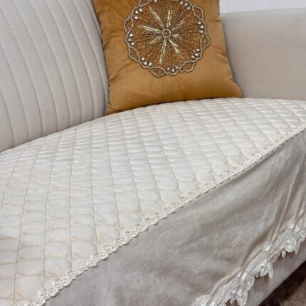 The Serene Choice: Pearl Cream Velvet Quilted Sofa Cover with Champagne Lace
